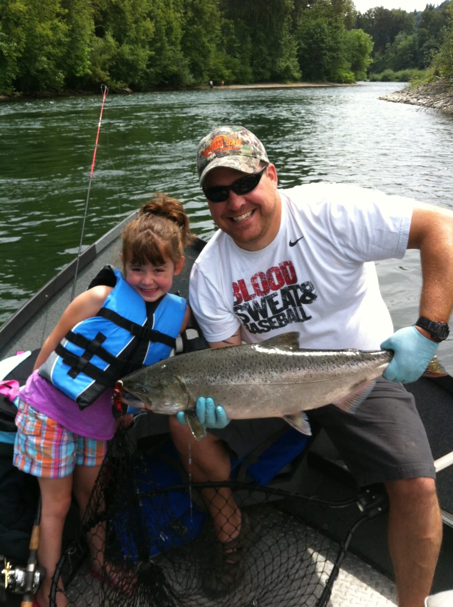Family fishing outing on the river